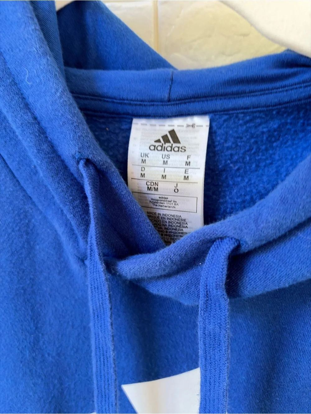 Adidas Blue Hoodie with White Logo and Shoulder Stripes